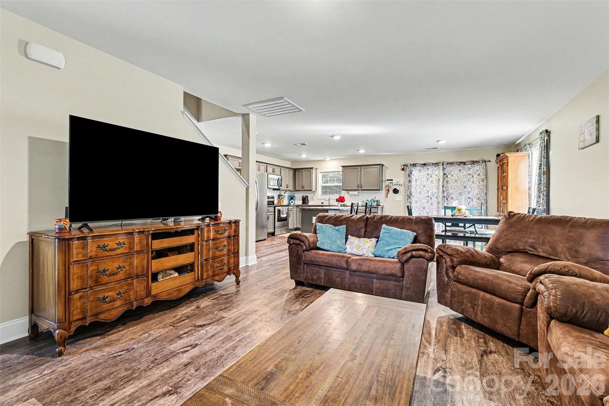 3401 State Rd S-46-76 Sharon, SC 29742 - Photo 7 of 44 a living room with furniture and a flat screen tv