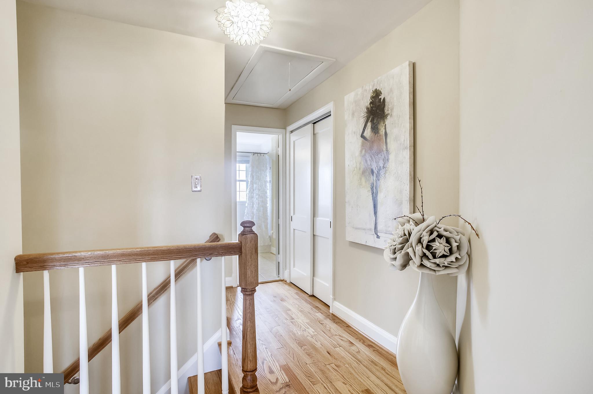 1409 Langford Road Baltimore, MD 21207 - Photo 28 of 39 a view of a hallway with wooden floor