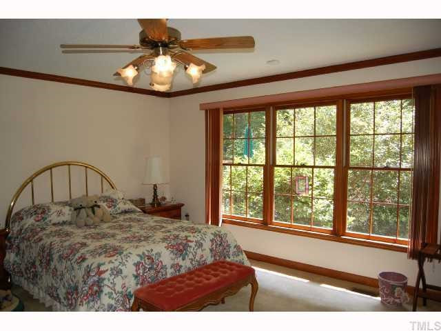 The master bedroom is 15.67' x 14.75'! Look at all those windows! When the camillias outside the window bloom, the view is just beautiful. (The shrubs do not block the windows view into the backyard.) Master Bedroom