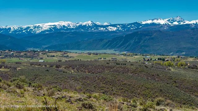 a view of lake and mountain