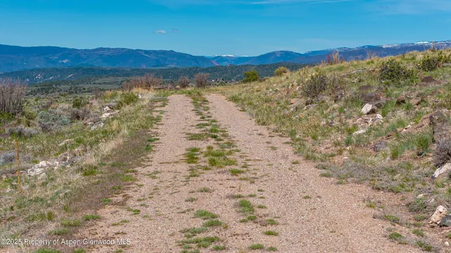 a view of a city of mountains and valleys
