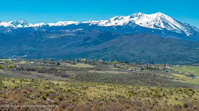 a view of a lake with a mountain