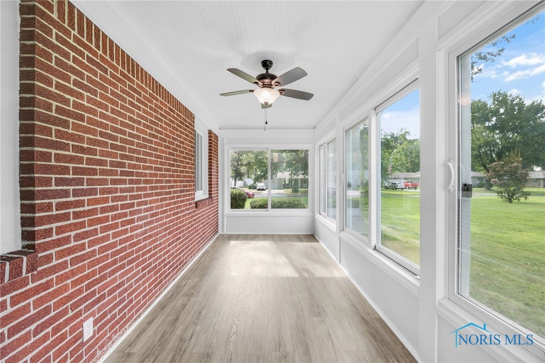 1053 Malcolm Road Toledo, OH 43615 - Photo 12 of 34 Sunroom off kitchen
