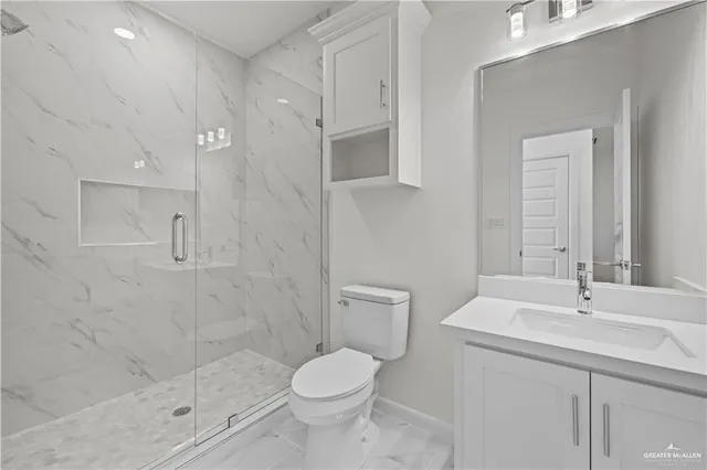 an empty room with a window and a ceiling fan