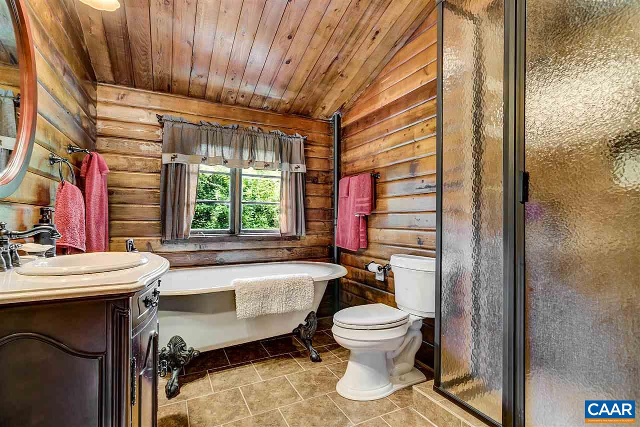 7580 Rixeyville Road Rixeyville, VA 22737 - Photo 11 of 28 a bathroom with a sink toilet and shower