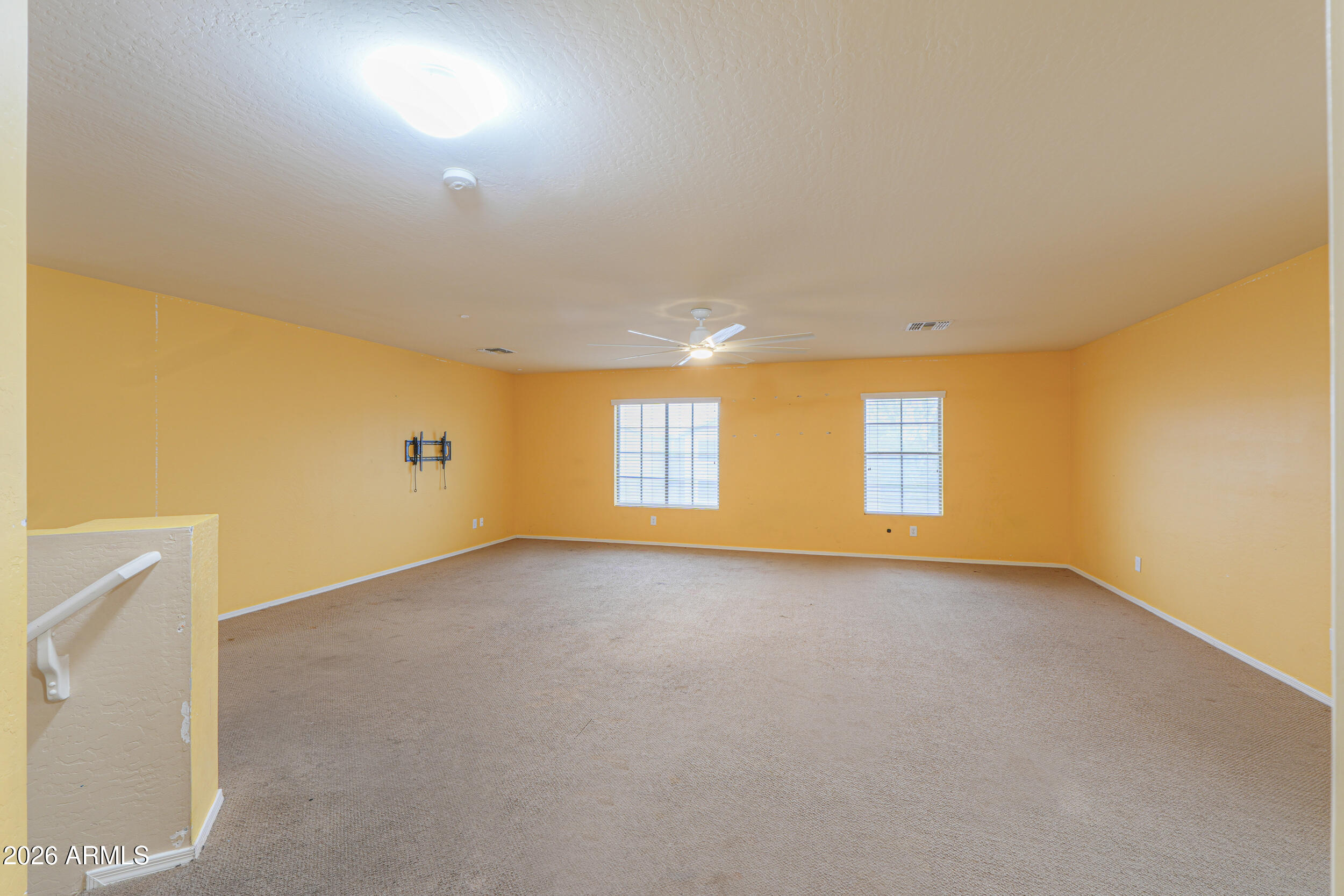 46136 West Sonny Road Maricopa, AZ 85139 - Photo 30 of 81 an empty room with windows