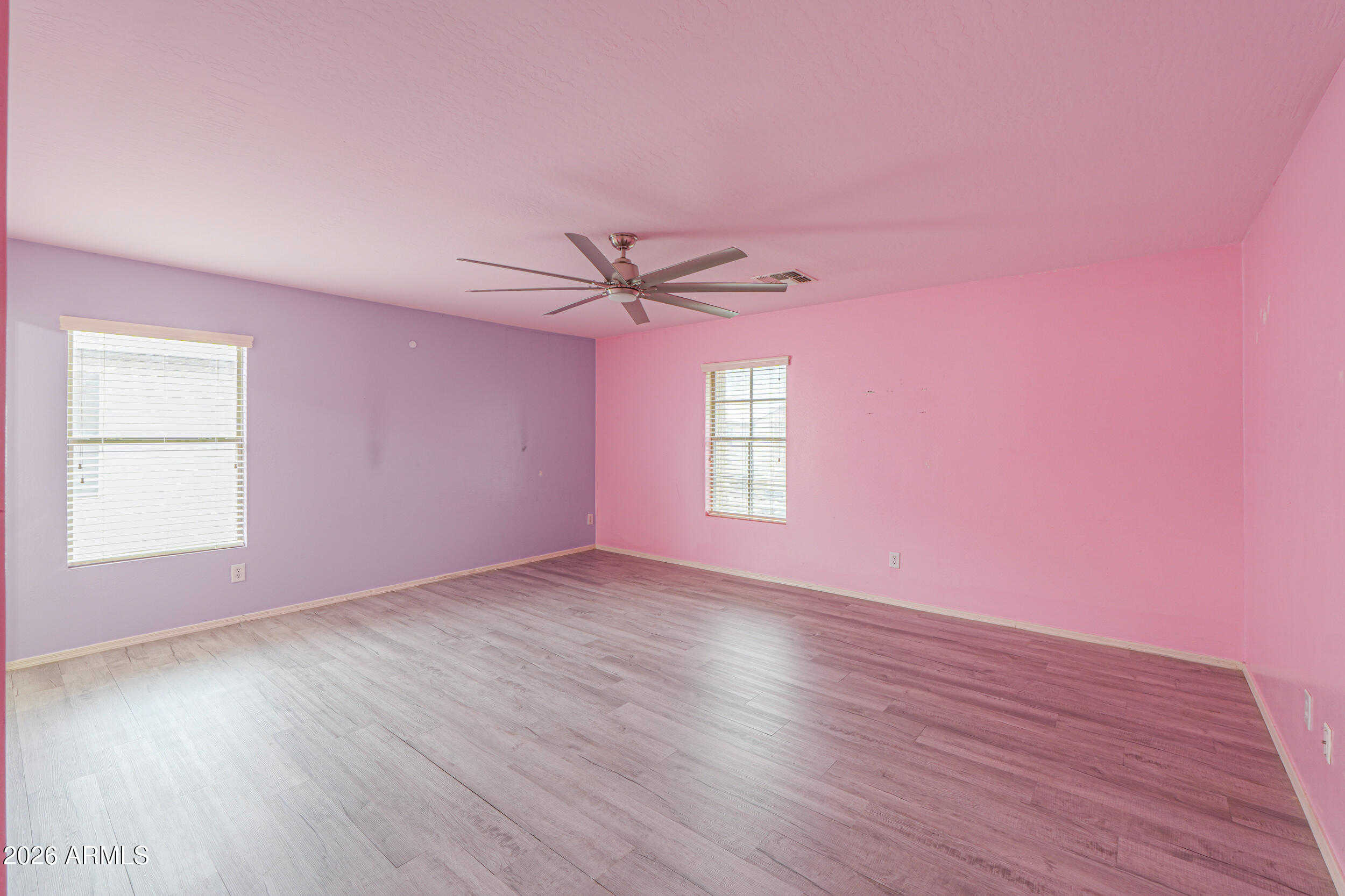 46136 West Sonny Road Maricopa, AZ 85139 - Photo 35 of 81 a view of a livingroom with wooden floor and a window