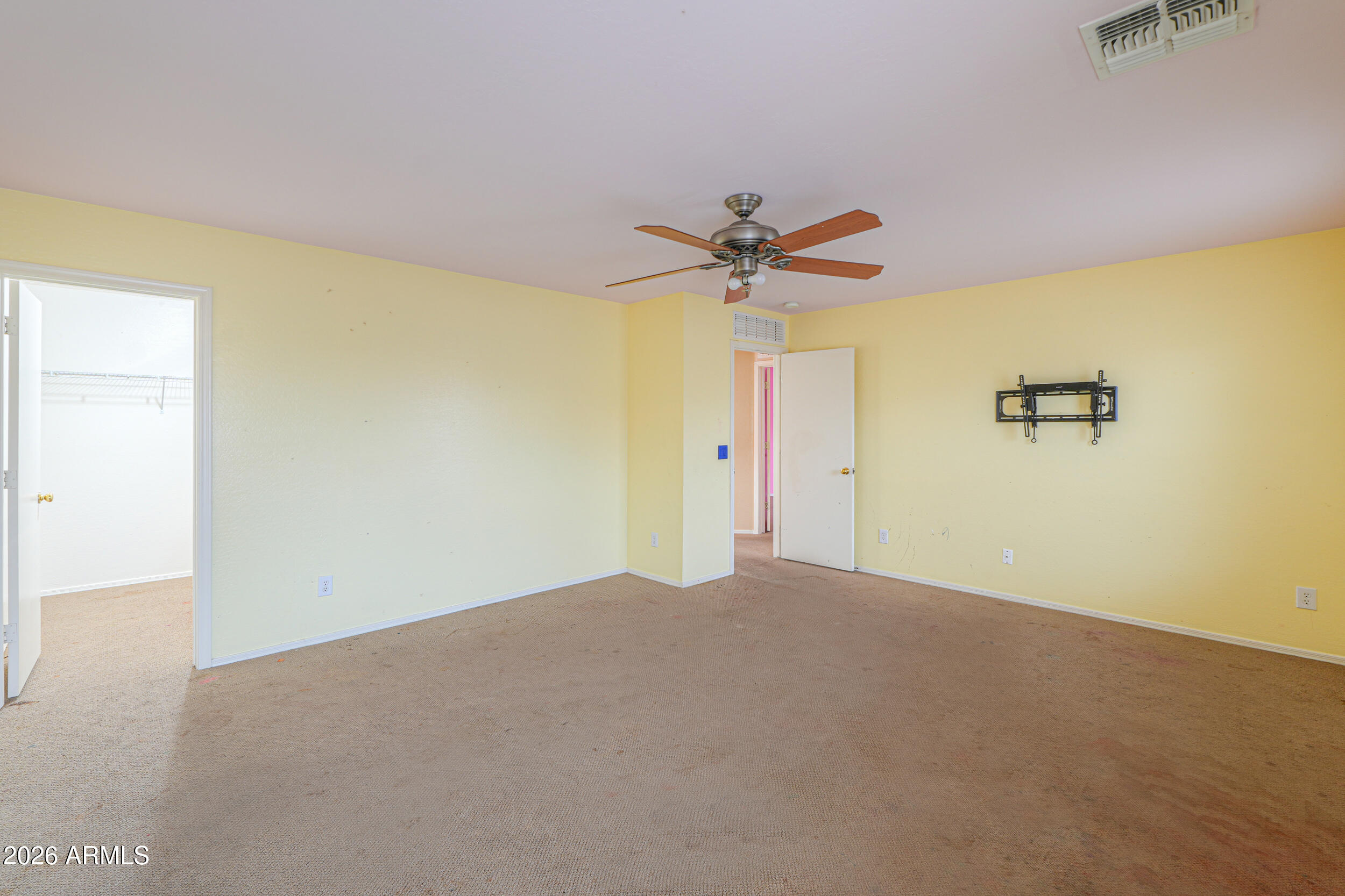 46136 West Sonny Road Maricopa, AZ 85139 - Photo 43 of 81 a view of a big room with a ceiling fan
