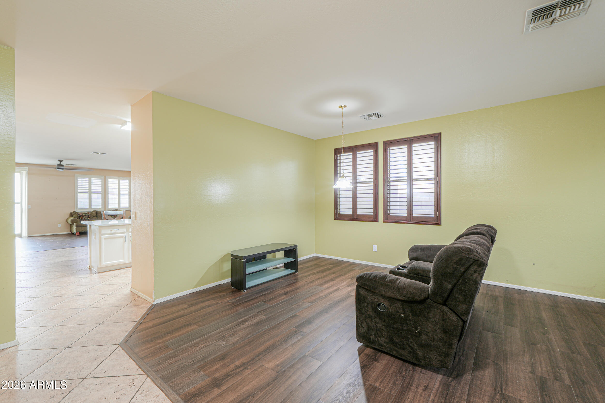 46136 West Sonny Road Maricopa, AZ 85139 - Photo 5 of 81 a living room with furniture and a window