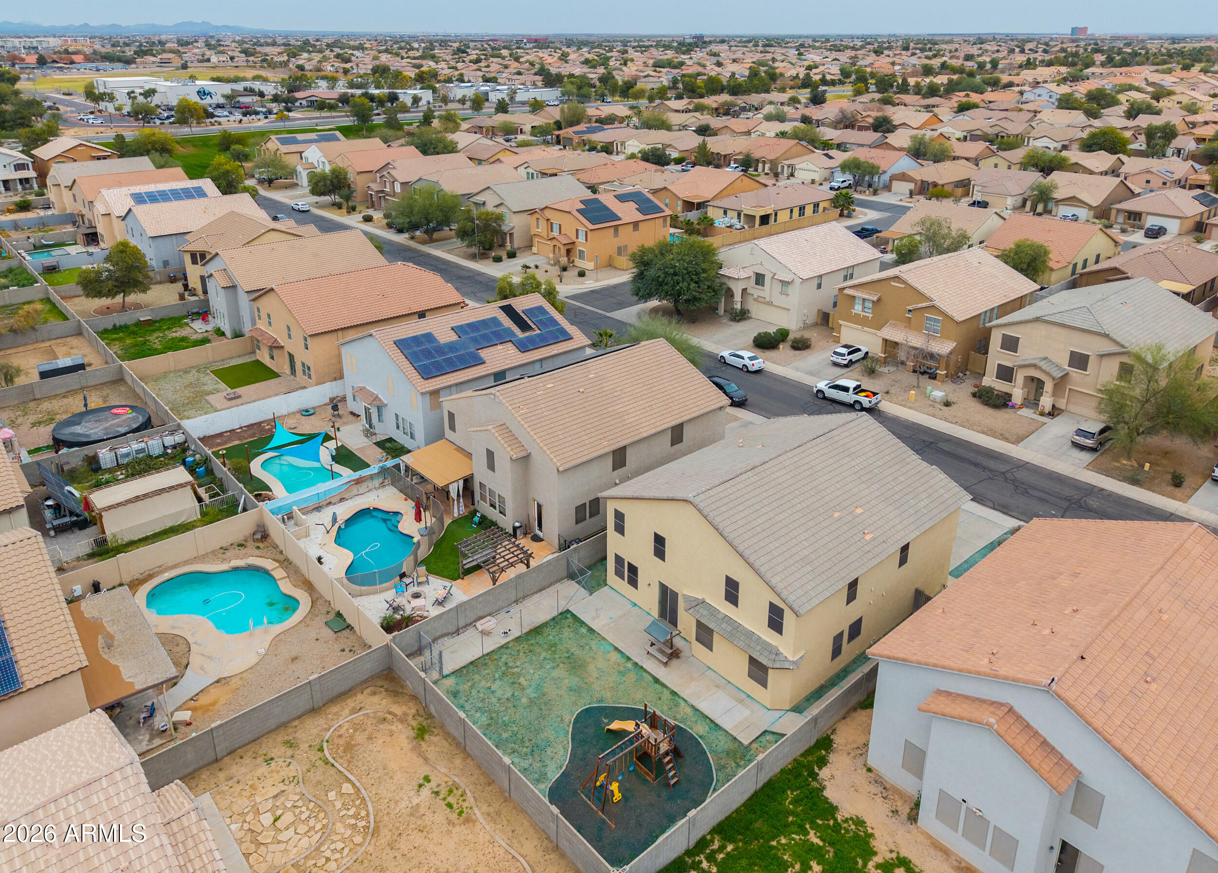 46136 West Sonny Road Maricopa, AZ 85139 - Photo 56 of 81 an aerial view of a city with lots of residential buildings