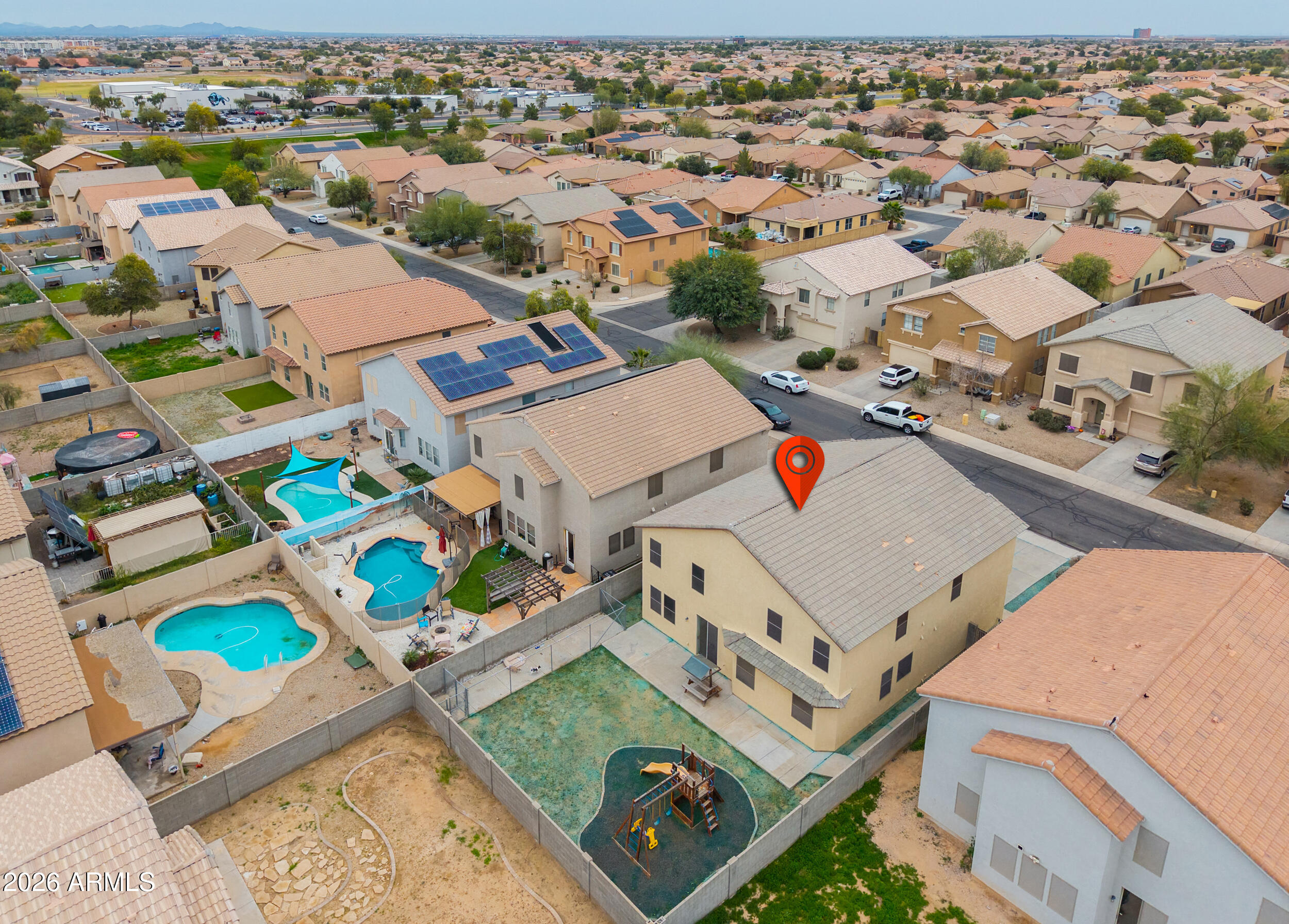 46136 West Sonny Road Maricopa, AZ 85139 - Photo 57 of 81 an aerial view of residential houses with outdoor space