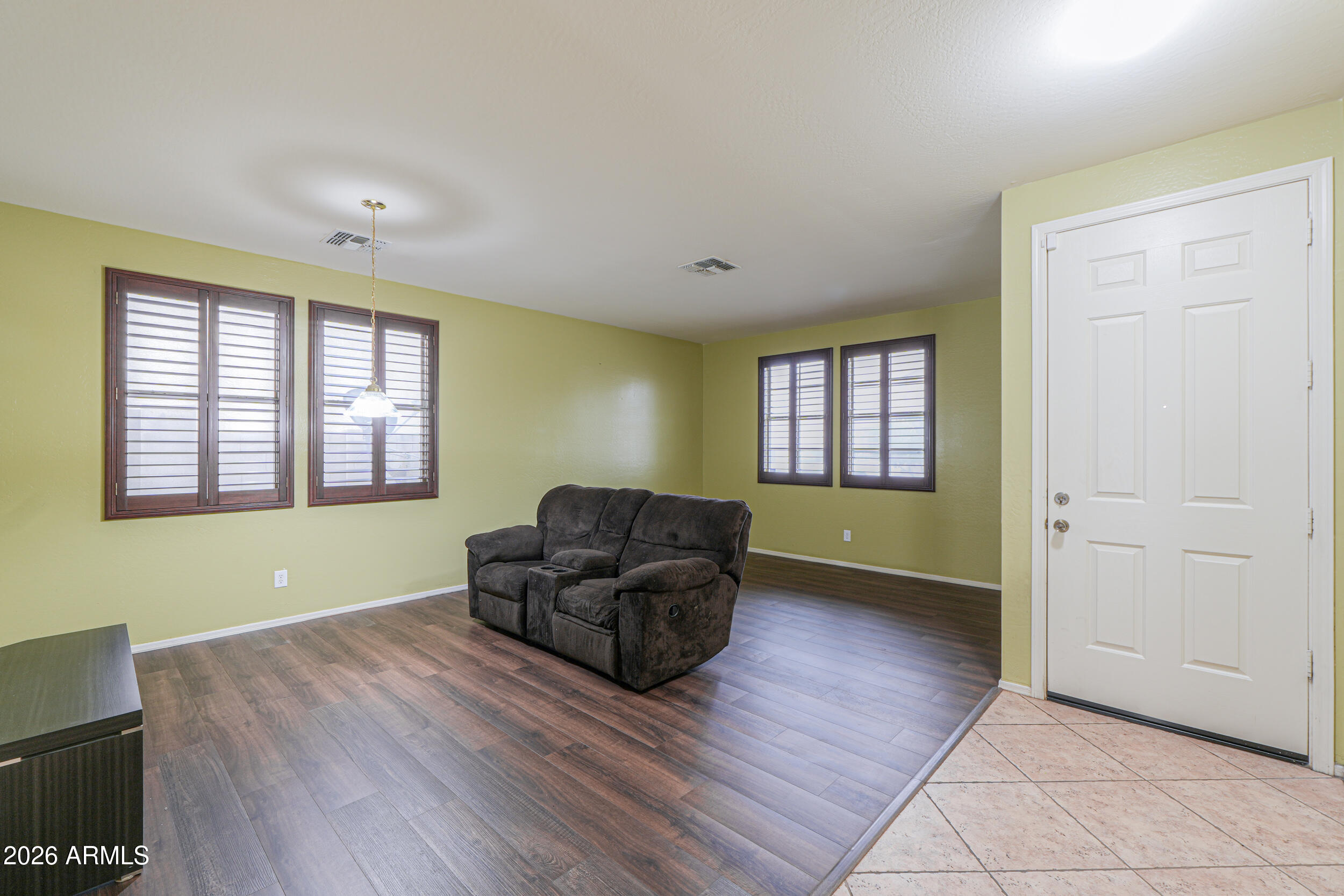 46136 West Sonny Road Maricopa, AZ 85139 - Photo 6 of 81 a living room with furniture and a window