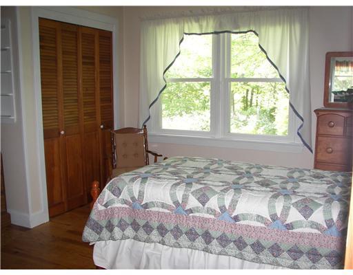 313 Old Lewiston Road Winthrop, ME 04364 - Photo 19 of 35 Bedroom. Sweet bedroom located just...