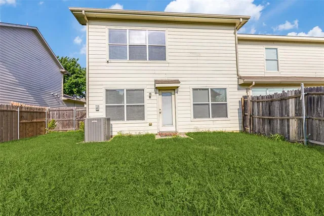 a view of backyard with house