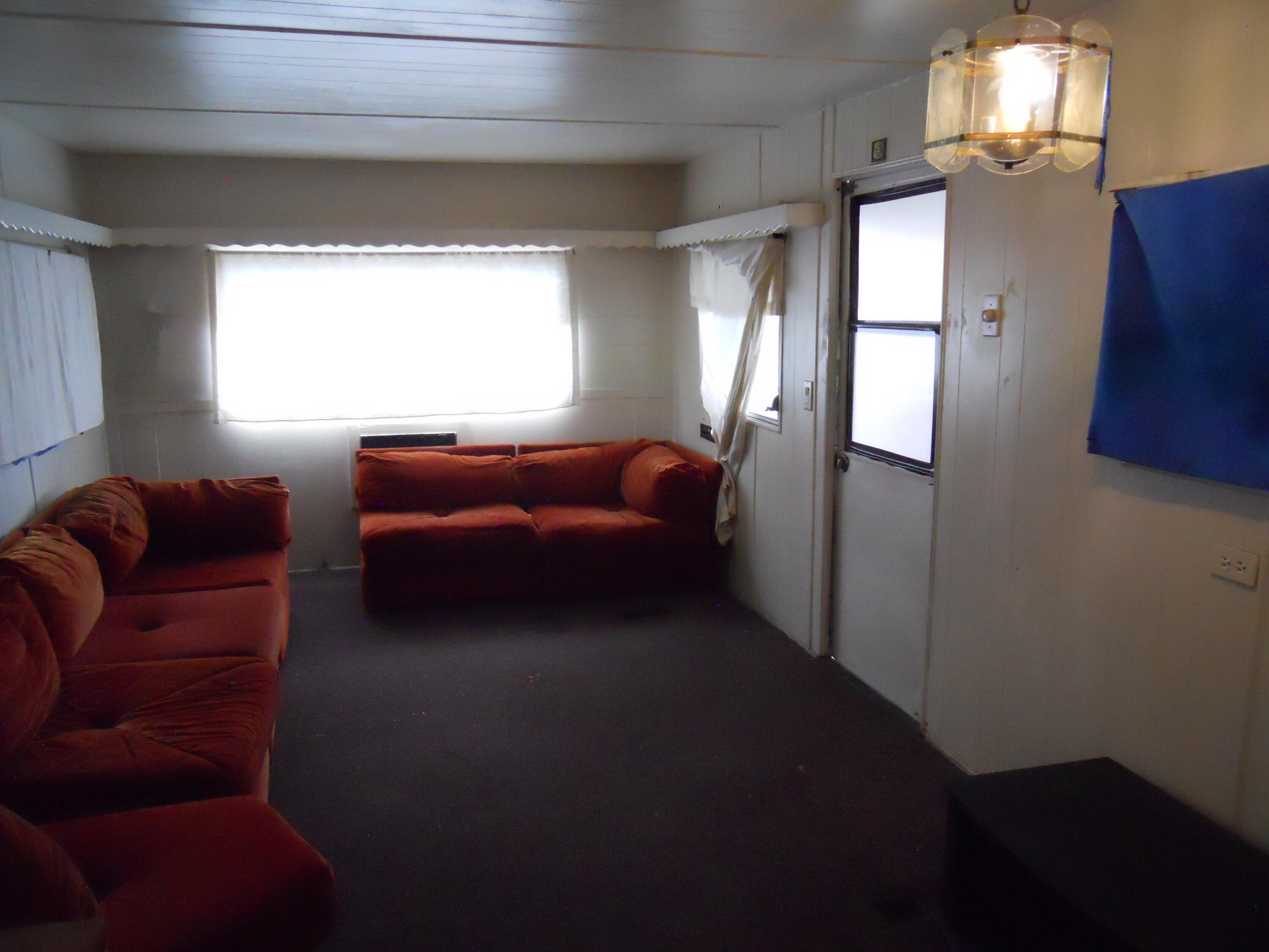 520 Pine Avenue, Unit 5 Goleta, CA 93117 - Photo 3 of 14 a living room with furniture and a window