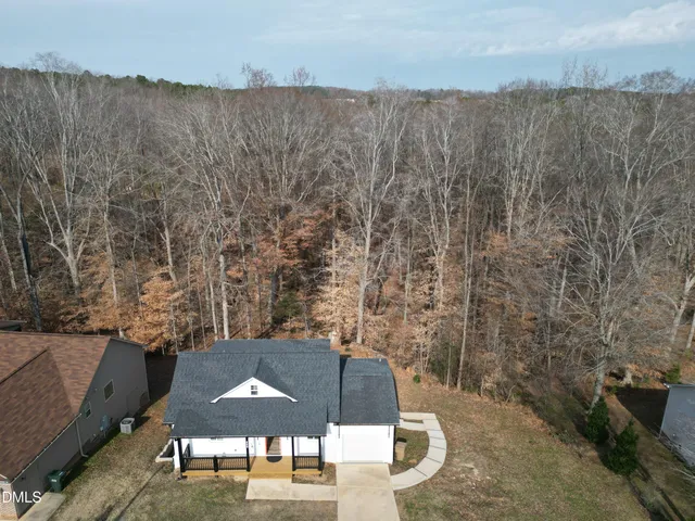 a view of balcony with wooden floor