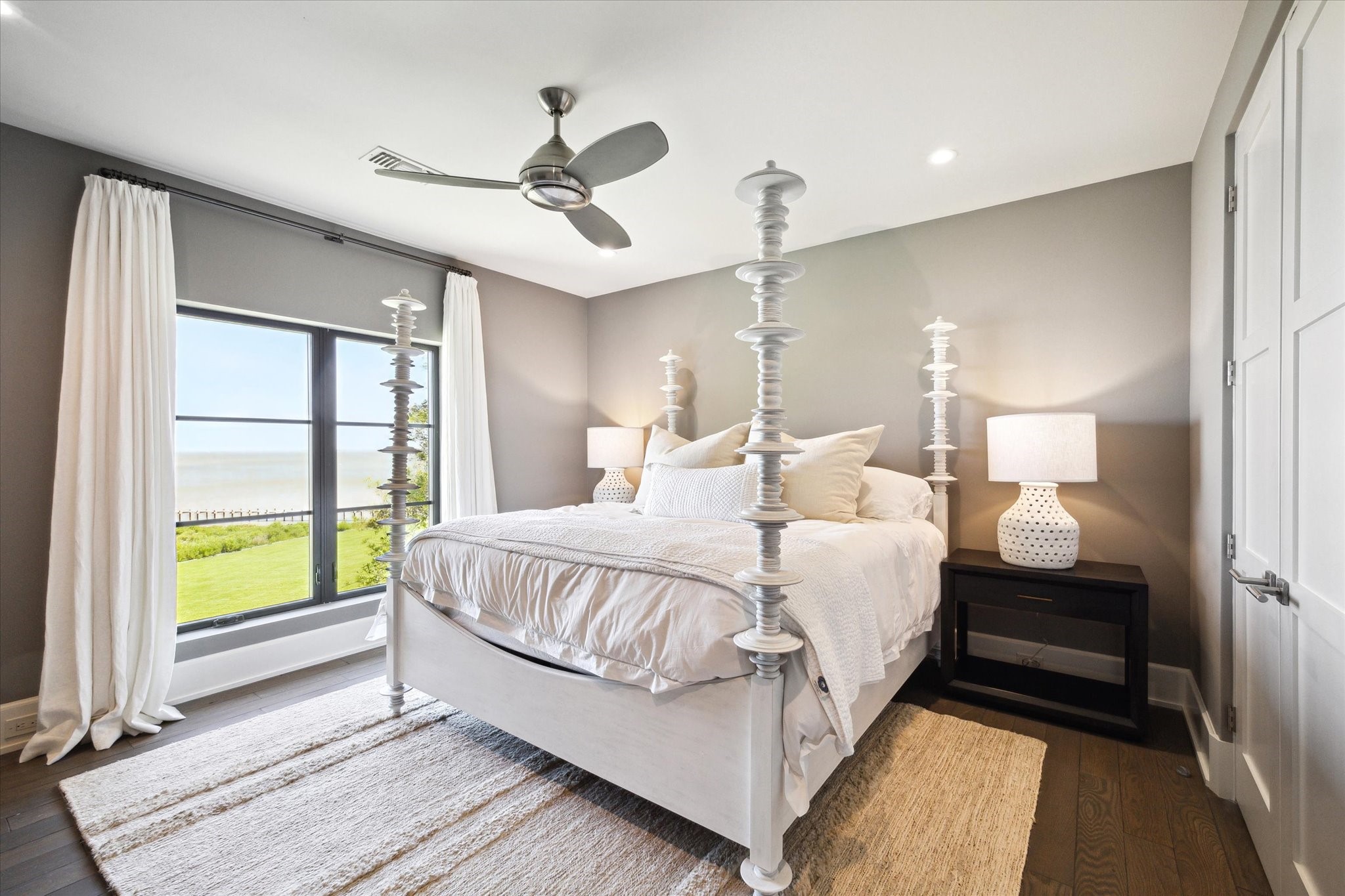 633 Quintana Roo Place Seabrook, TX 77586 - Photo 28 of 47 Bedroom #3 is elegant and comfortable with an en suite bathroom and glorious views of the bay.