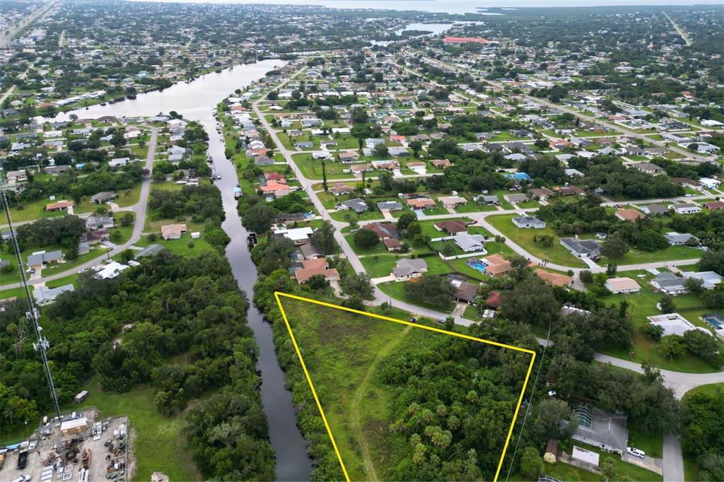 2120 Broad Ranch Drive Port Charlotte, FL 33948 - Photo 3 of 3 an aerial view of residential houses with outdoor space