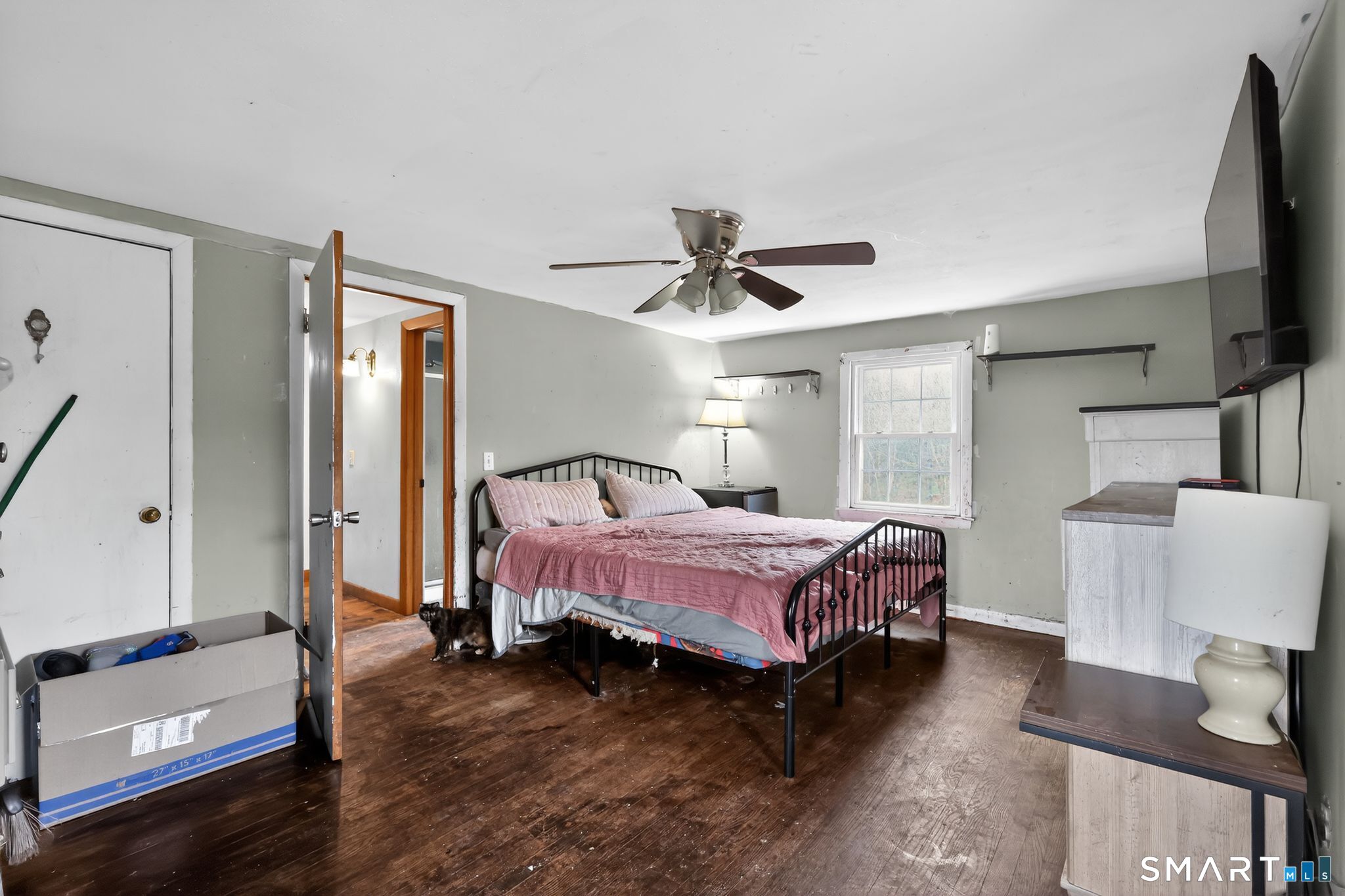 172 Bailey Hill Road Killingly, CT 06239 - Photo 11 of 35 a spacious bedroom with a bed and a flat screen tv