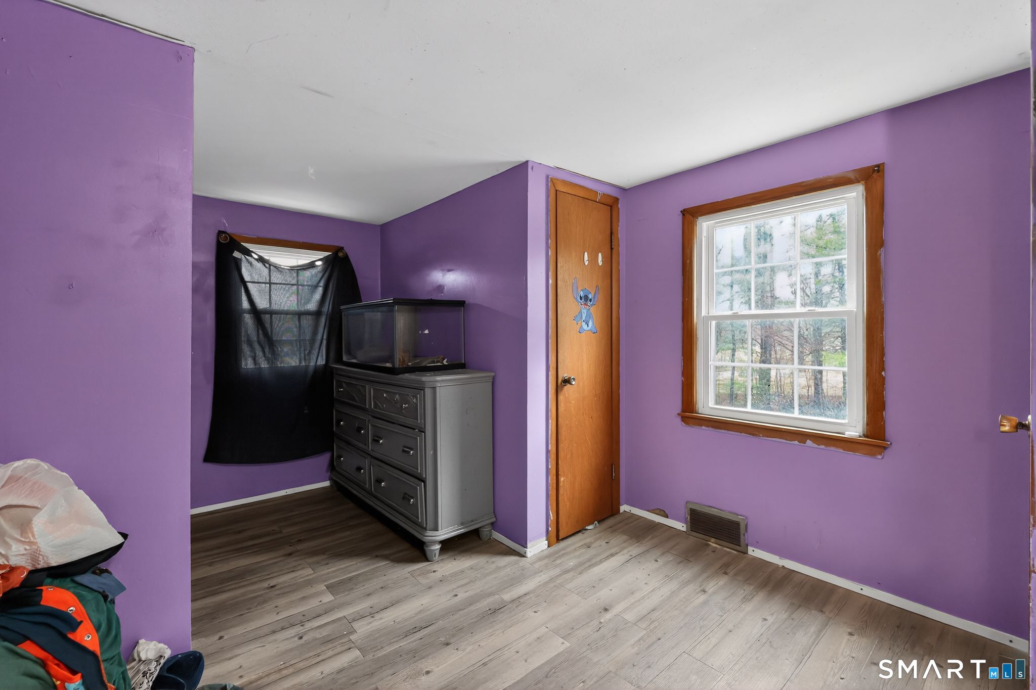 172 Bailey Hill Road Killingly, CT 06239 - Photo 13 of 35 a view of an empty room window and wooden floor
