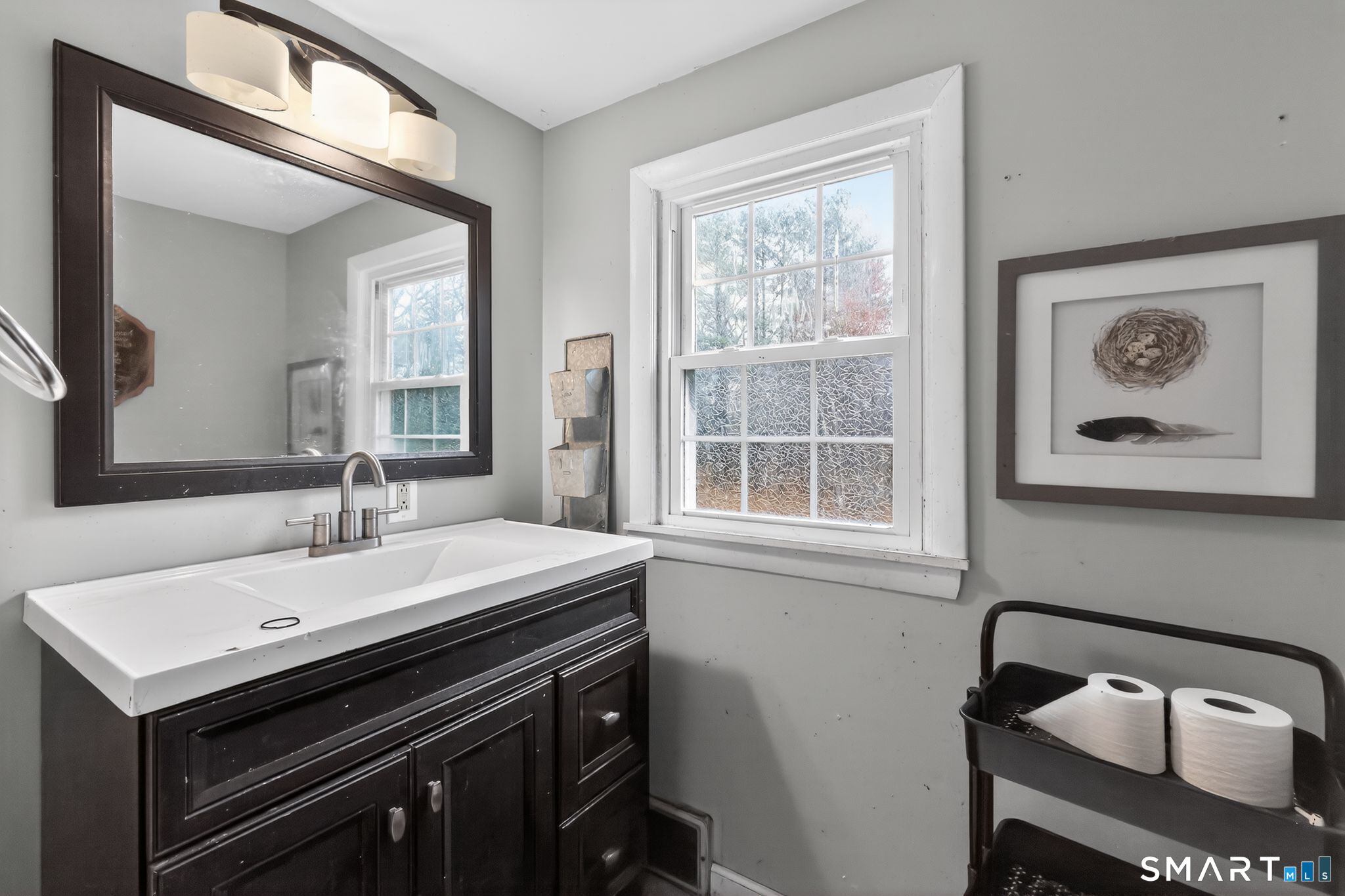 172 Bailey Hill Road Killingly, CT 06239 - Photo 19 of 35 a bathroom with a sink and a mirror