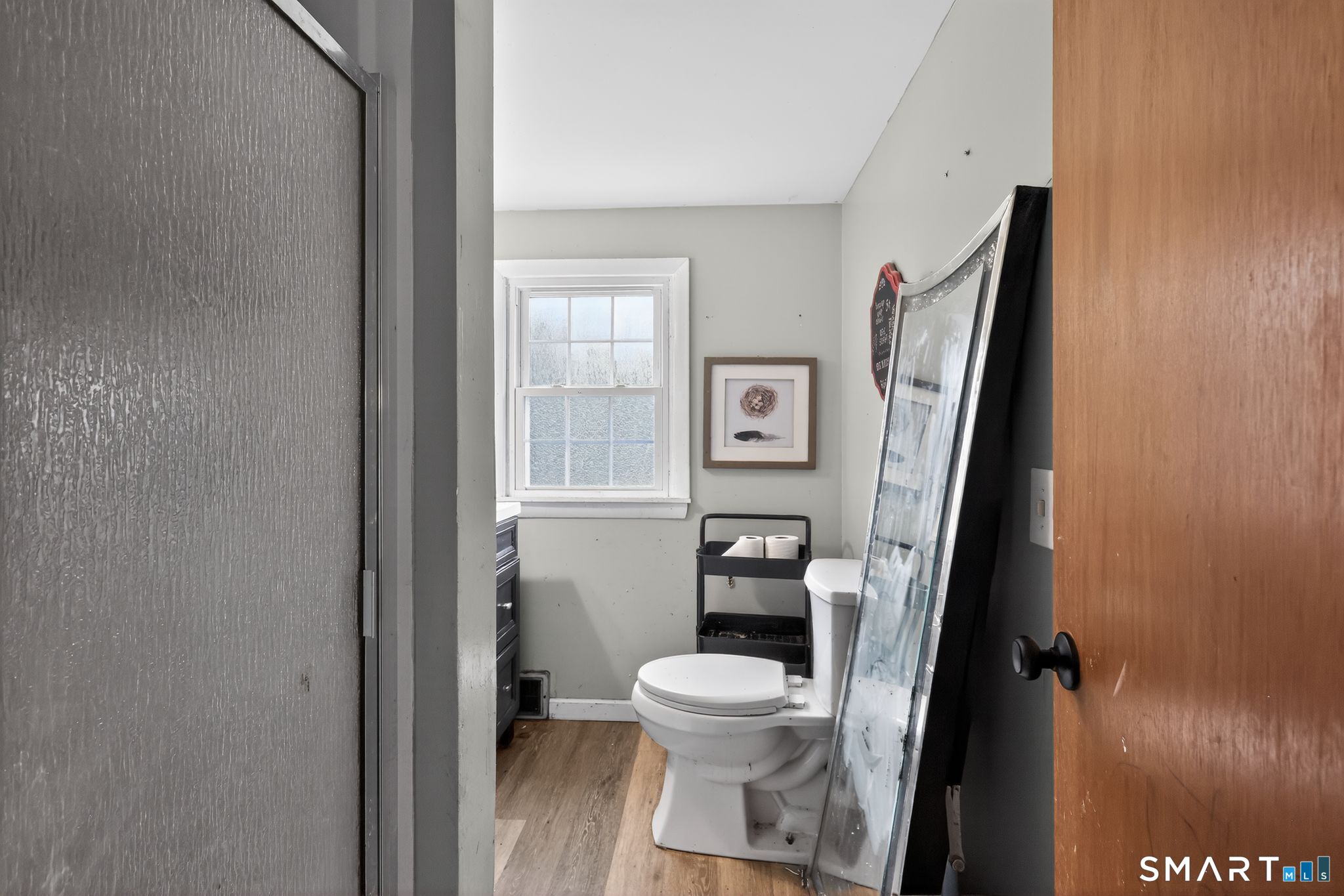 172 Bailey Hill Road Killingly, CT 06239 - Photo 22 of 35 a white toilet sitting next to a bathroom sink