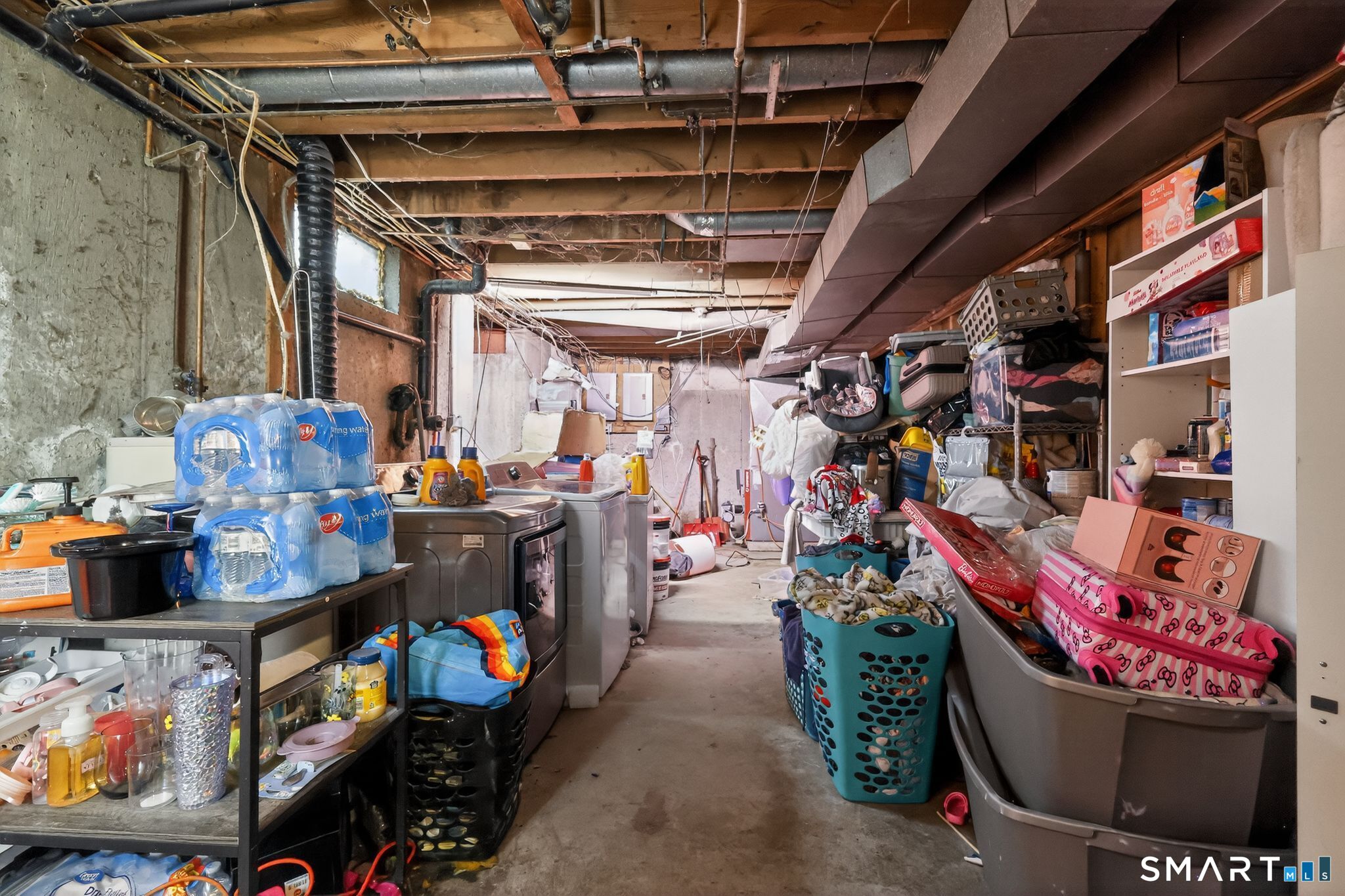 172 Bailey Hill Road Killingly, CT 06239 - Photo 27 of 35 a view of store room with clothes