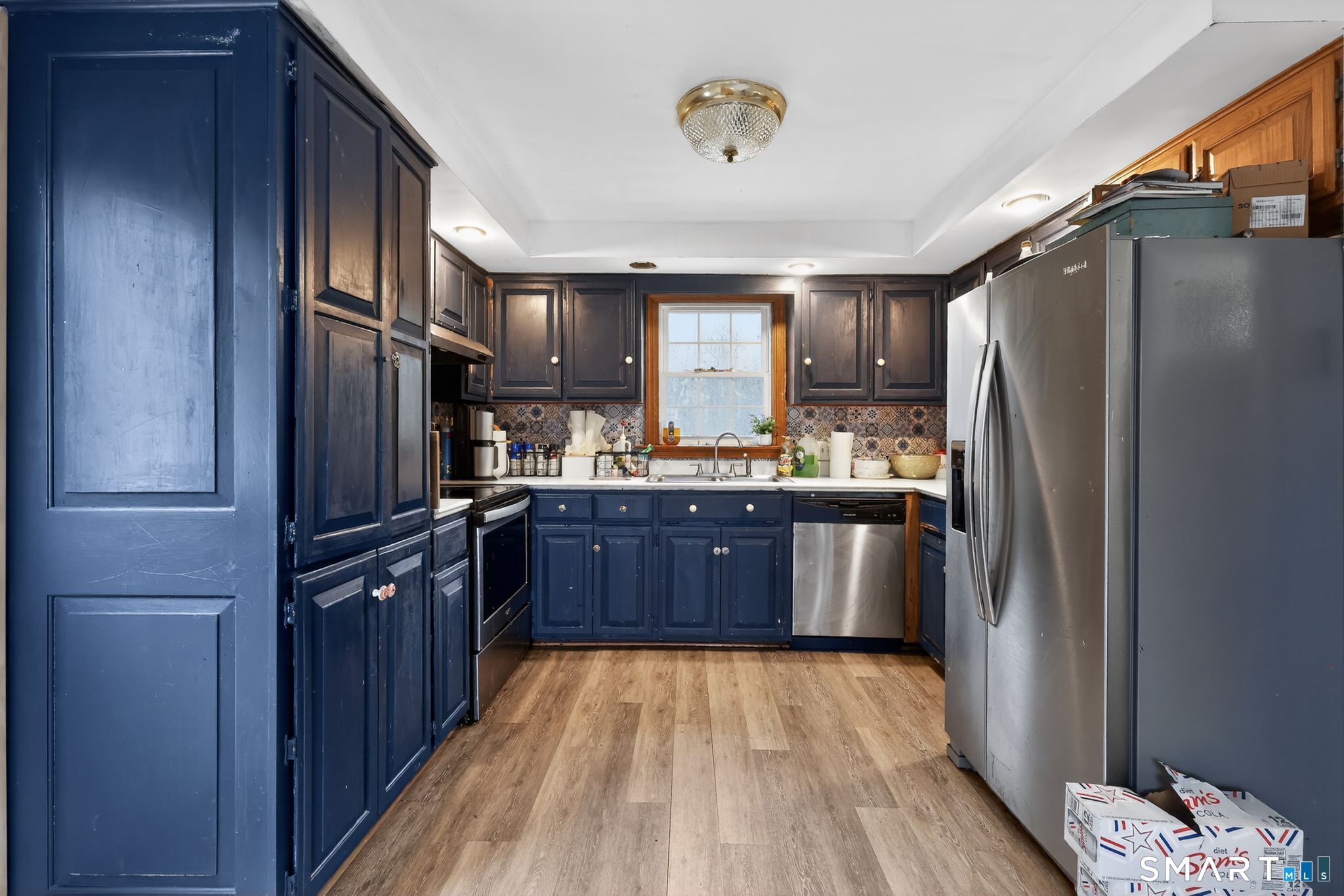 172 Bailey Hill Road Killingly, CT 06239 - Photo 7 of 35 a kitchen with stainless steel appliances granite countertop a refrigerator and a sink