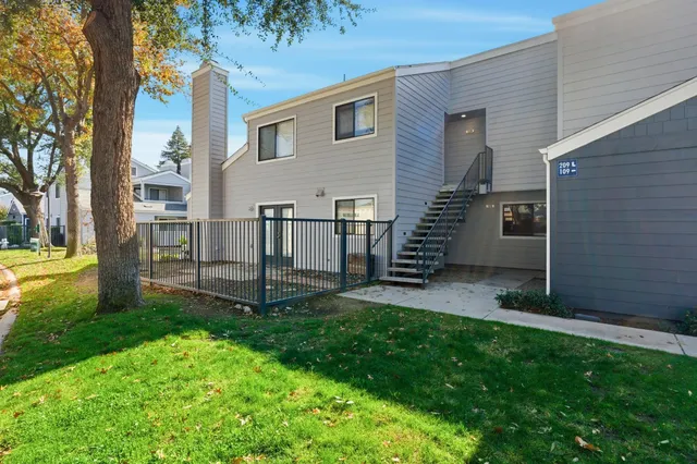 a view of a back yard of the house