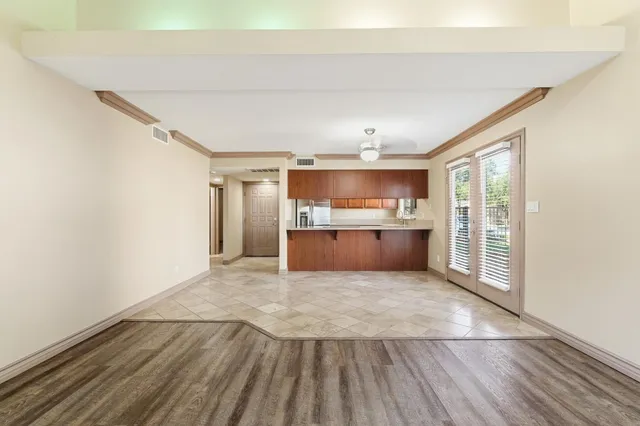 a view of kitchen with wooden floor
