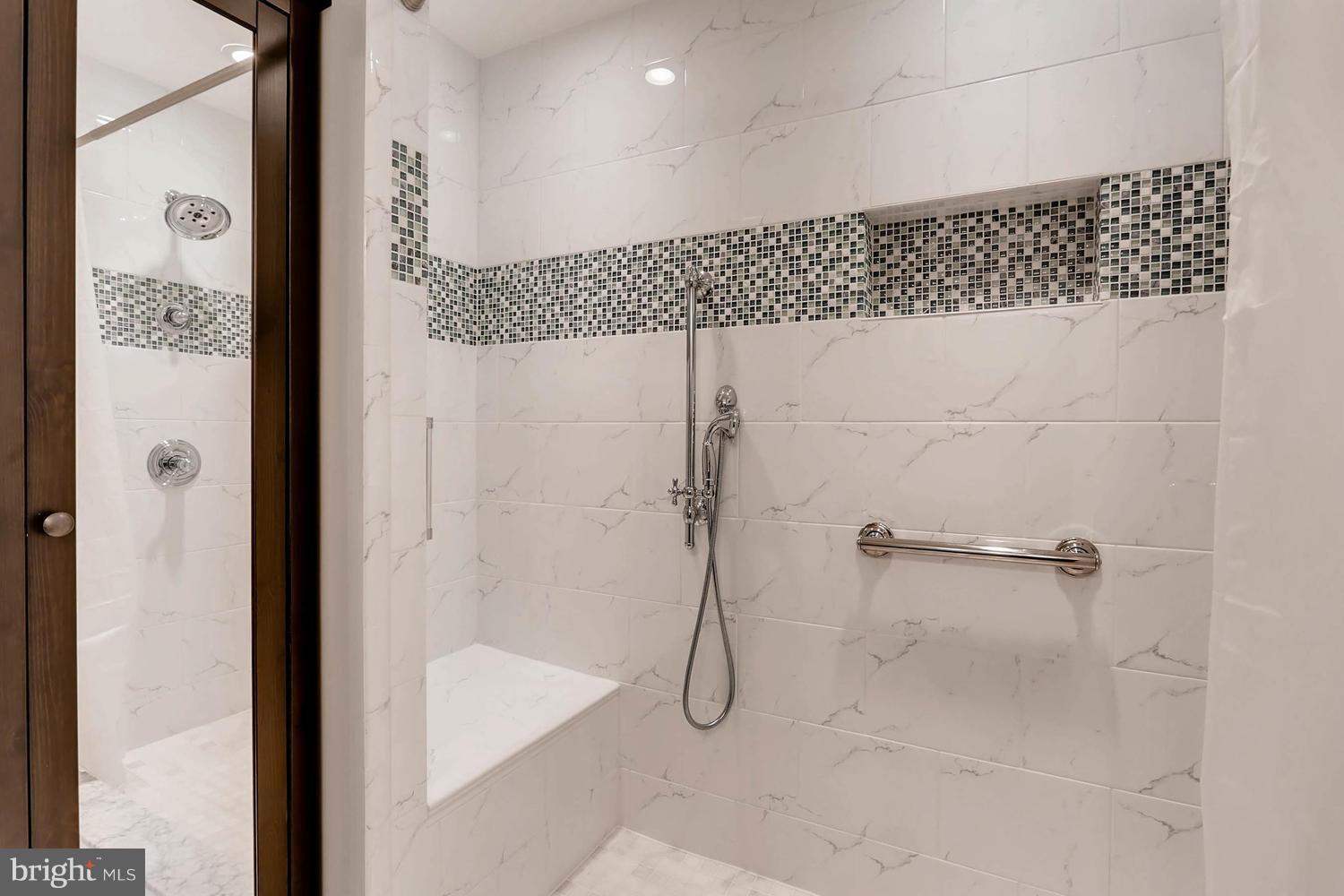 14912 Old York Road Phoenix, MD 21131 - Photo 19 of 27 SHOWER W/ RECESSED NICHES, SEATING, DUAL FAUCETS