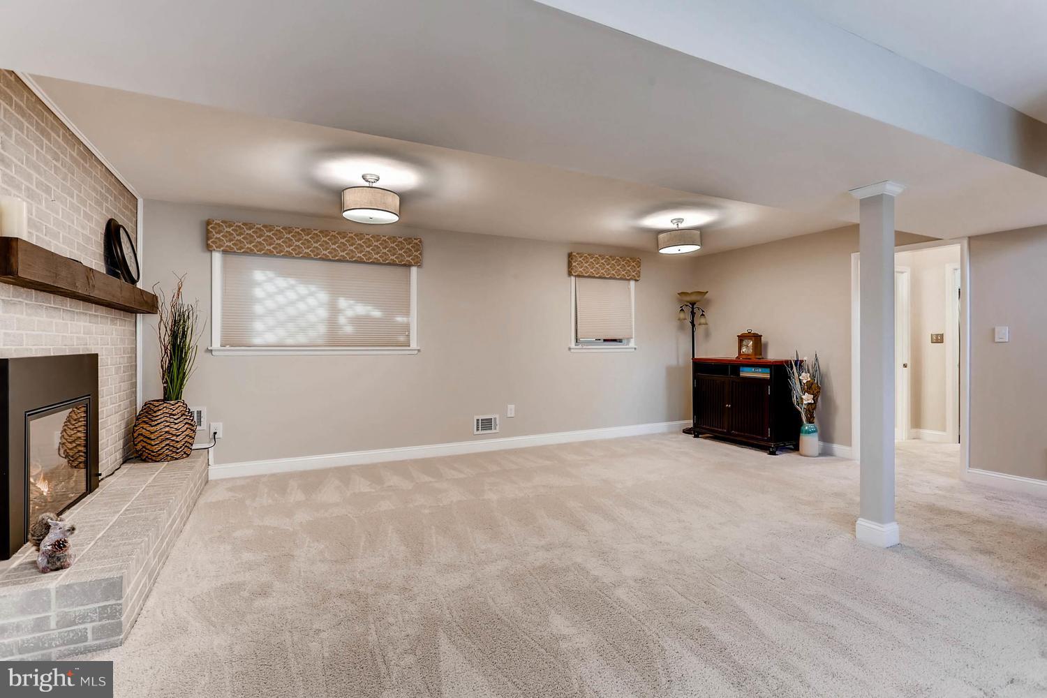 14912 Old York Road Phoenix, MD 21131 - Photo 22 of 27 DAYLIGHT LL W/ REMOTE GAS FP, RM FOR POOL TABLE