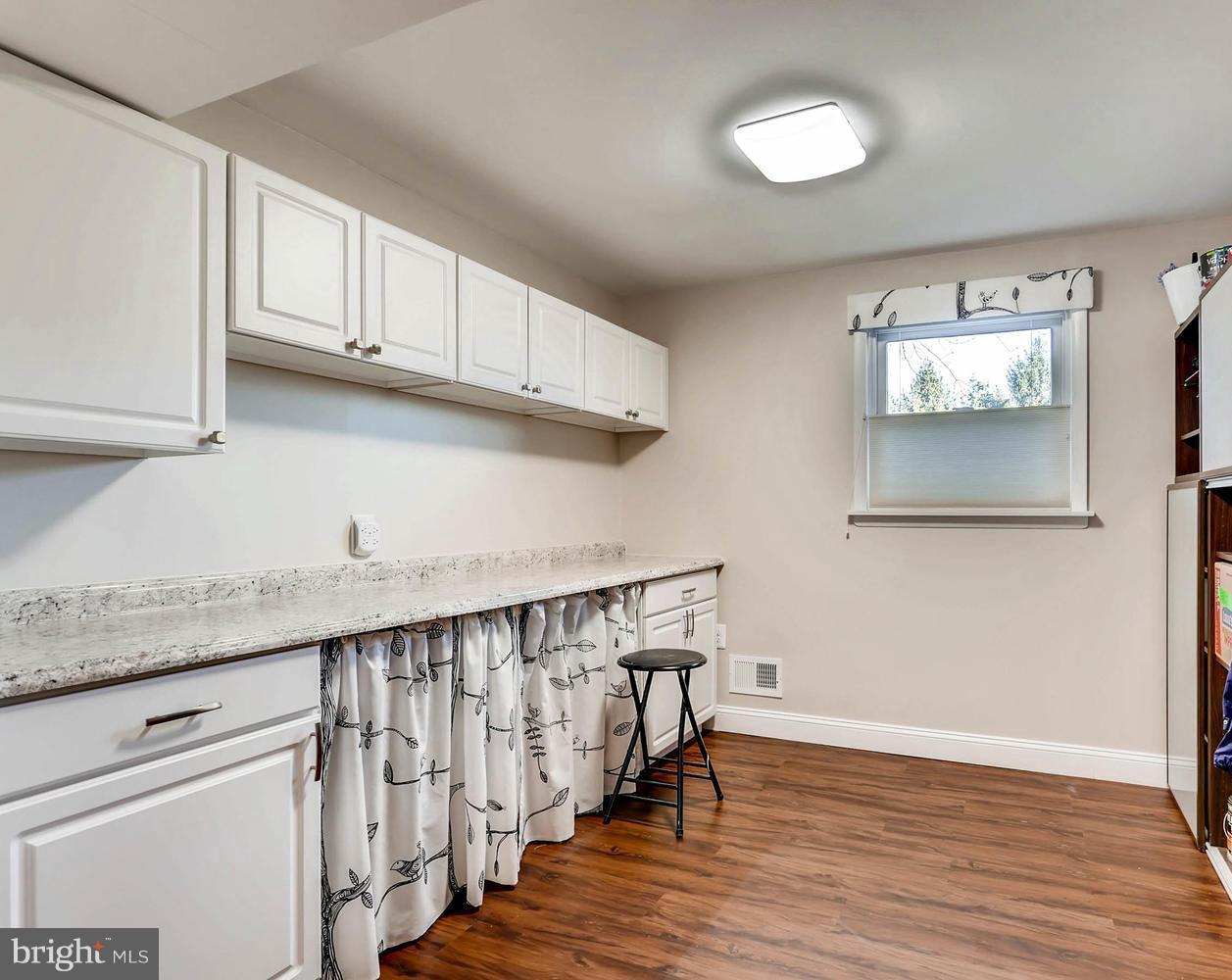 14912 Old York Road Phoenix, MD 21131 - Photo 23 of 27 CRAFT/PROJECT ROOM W/ STORAGE, CABINETS, COUNTER