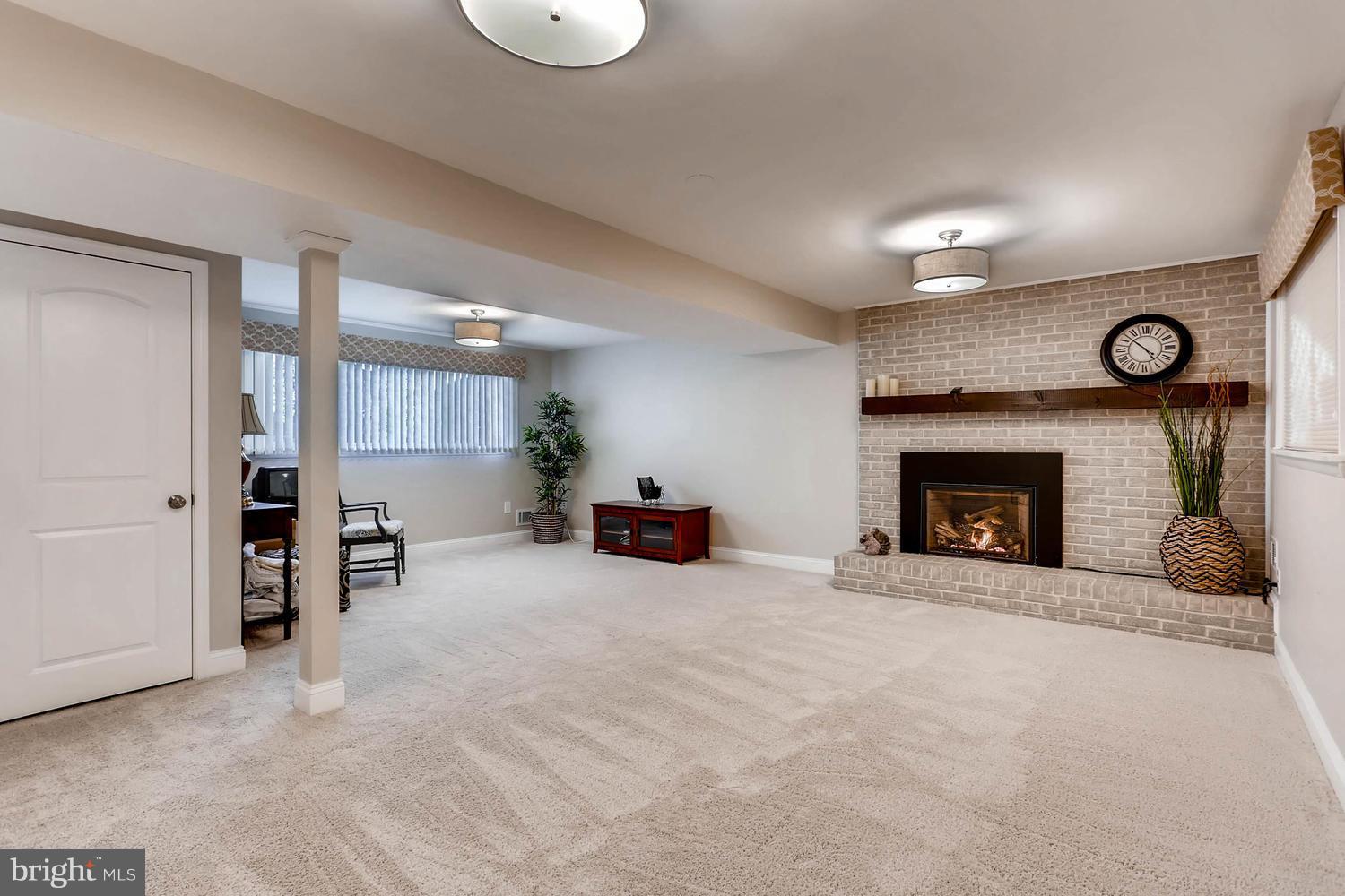 14912 Old York Road Phoenix, MD 21131 - Photo 8 of 27 LL REC RM W/ GAS FP, PLUSH COMFORT SMART CARPET