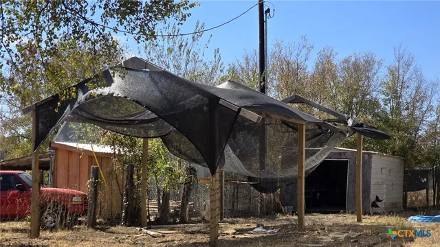 a view of a house with a iron stairs