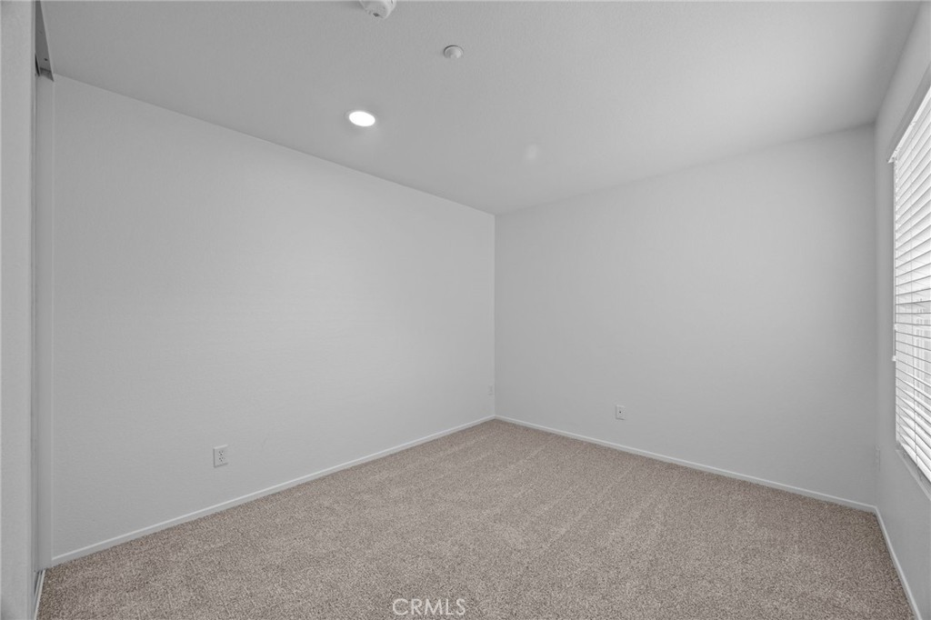 7353 Ellena West, Unit 112 Rancho Cucamonga, CA 91730 - Photo 22 of 36 a view of an empty room