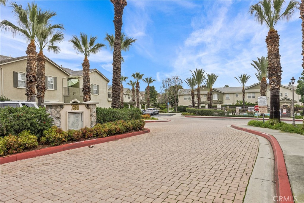 7353 Ellena West, Unit 112 Rancho Cucamonga, CA 91730 - Photo 34 of 36 a view of a street with a building in the background