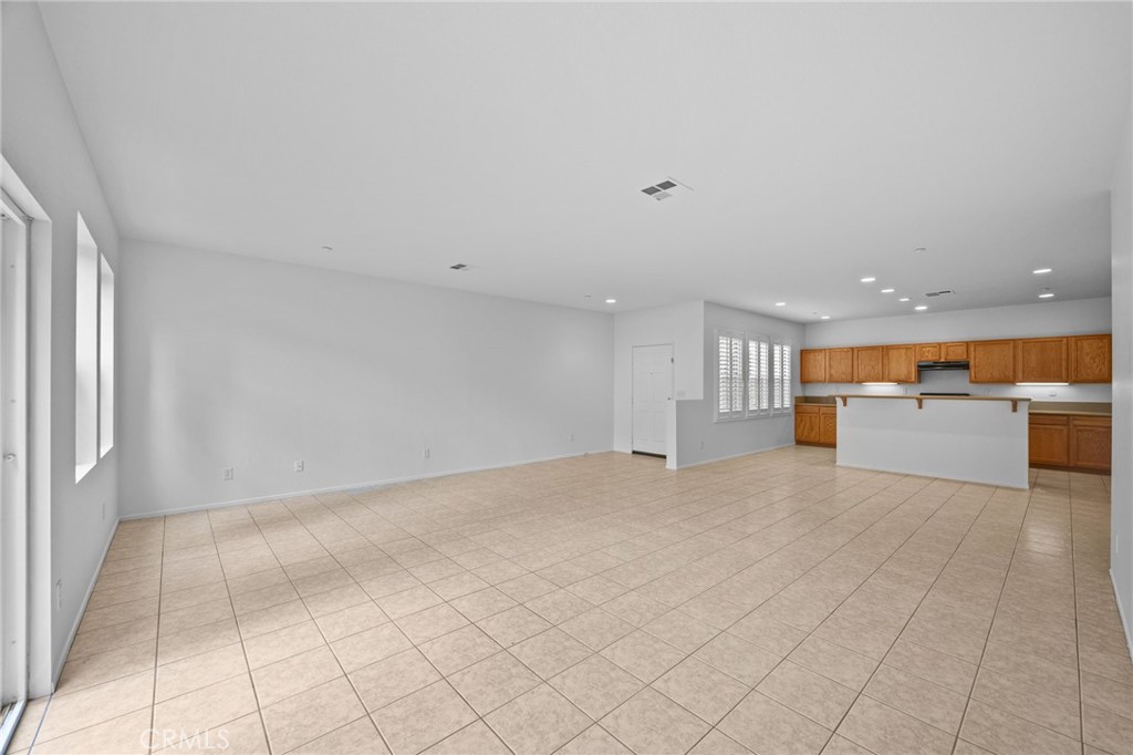 7353 Ellena West, Unit 112 Rancho Cucamonga, CA 91730 - Photo 7 of 36 a view of a livingroom with a fireplace