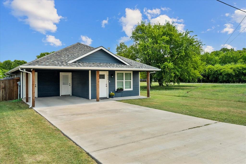 408 South Cedar Street Leonard, TX 75452 - Photo 2 of 22 a front view of a house with a garden