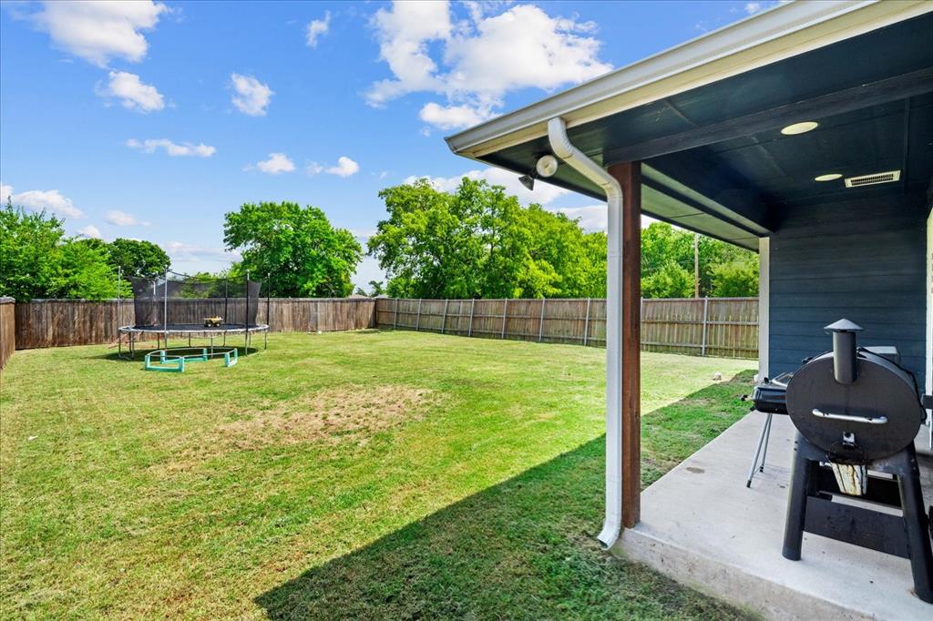 408 South Cedar Street Leonard, TX 75452 - Photo 21 of 22 a house view with a garden space