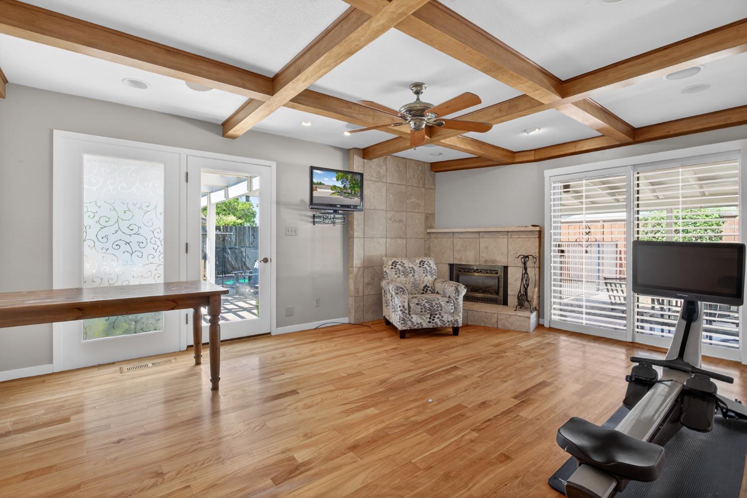 1909 Chelwood Way Modesto, CA 95355 - Photo 13 of 44 a bedroom with furniture a chandelier and wooden floor