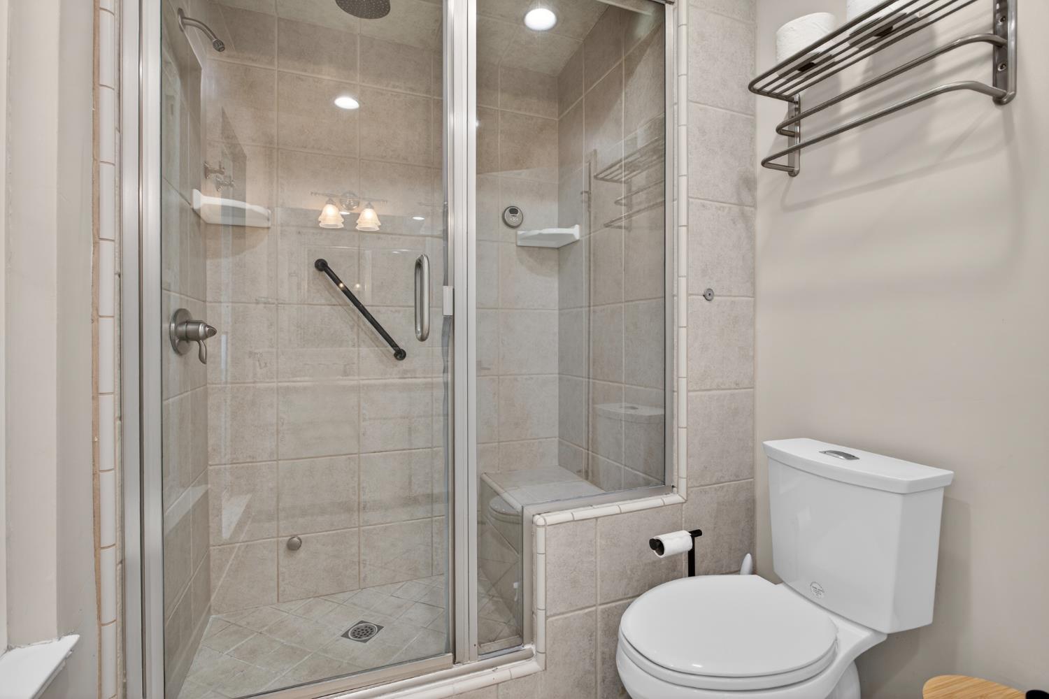 1909 Chelwood Way Modesto, CA 95355 - Photo 24 of 44 a white toilet sitting next to a bathroom