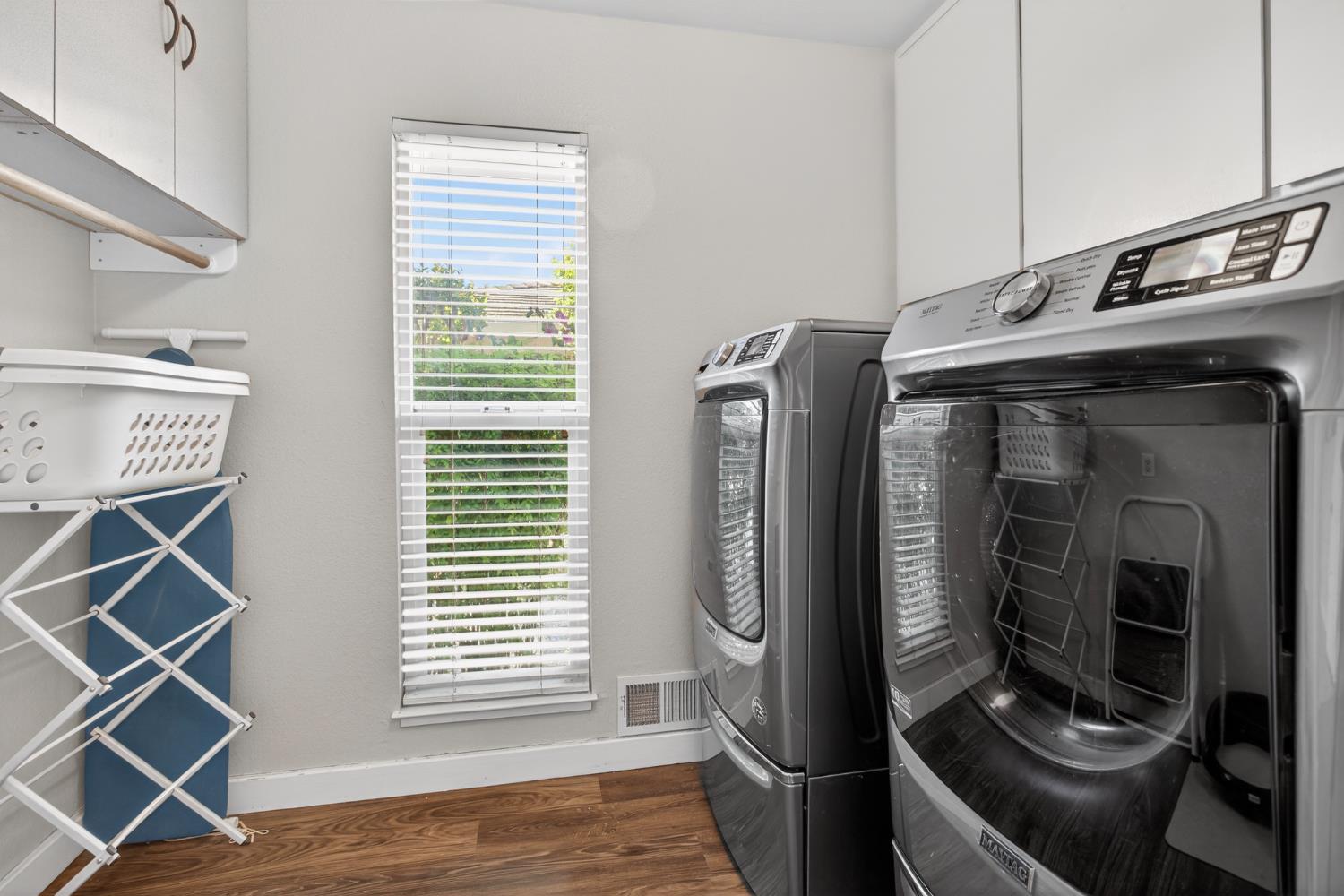 1909 Chelwood Way Modesto, CA 95355 - Photo 27 of 44 a kitchen with stainless steel appliances granite countertop a stove and a refrigerator