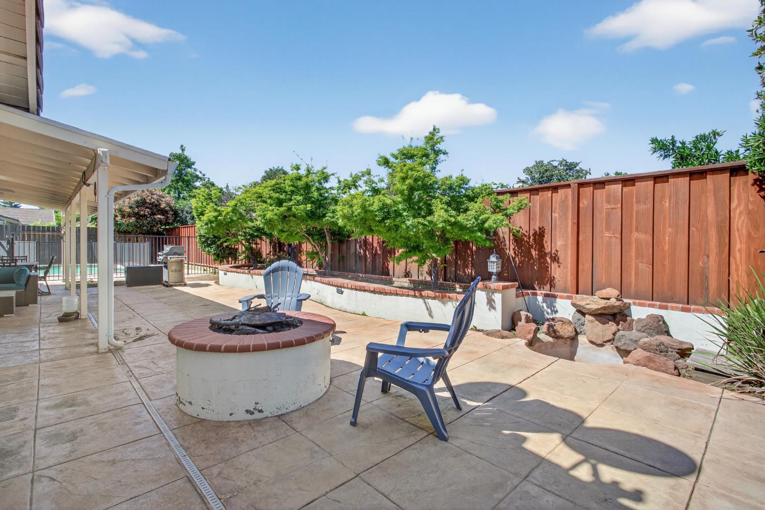 1909 Chelwood Way Modesto, CA 95355 - Photo 39 of 44 a outdoor space with the couches and a potted plant