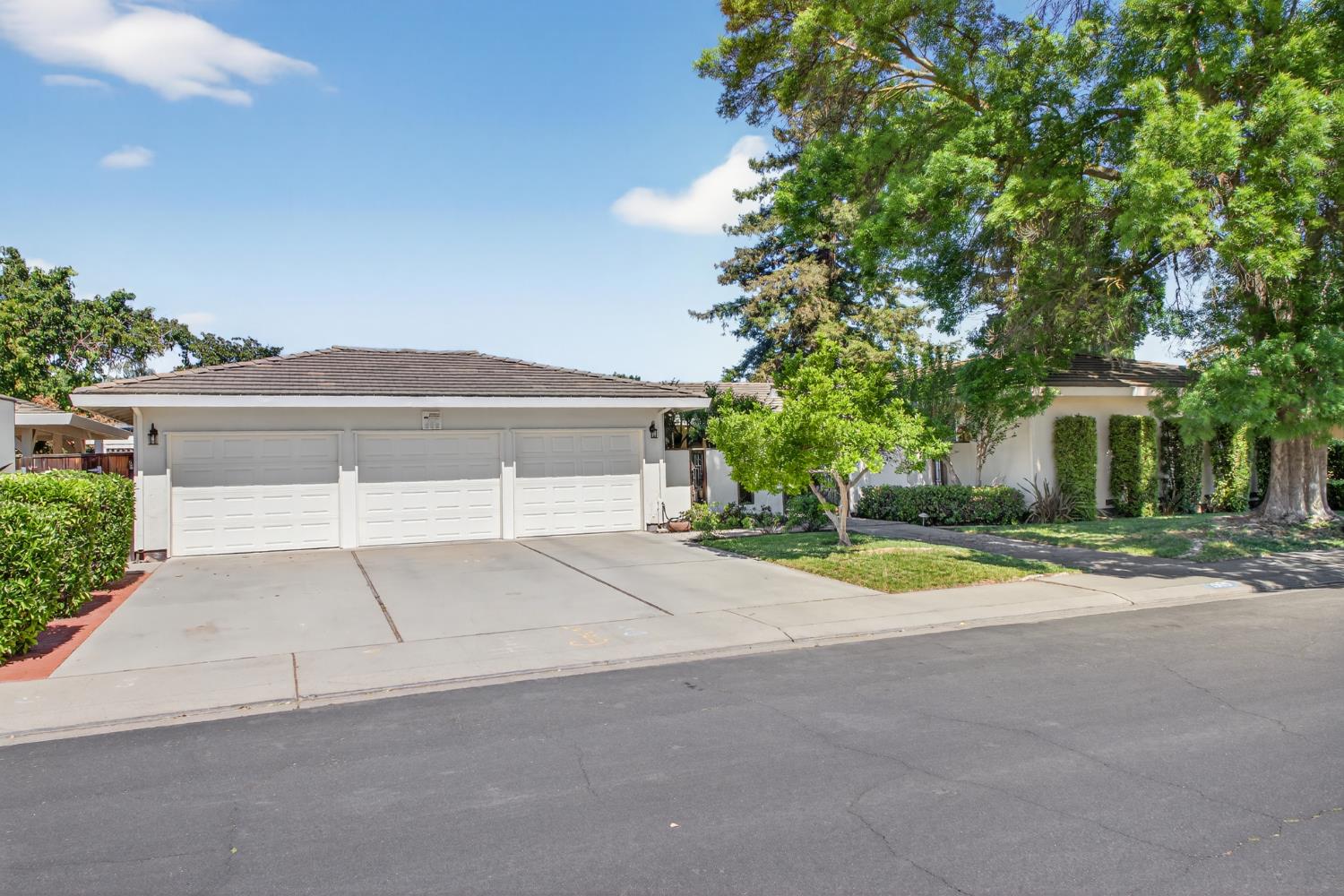 1909 Chelwood Way Modesto, CA 95355 - Photo 42 of 44 front view of a house with a street