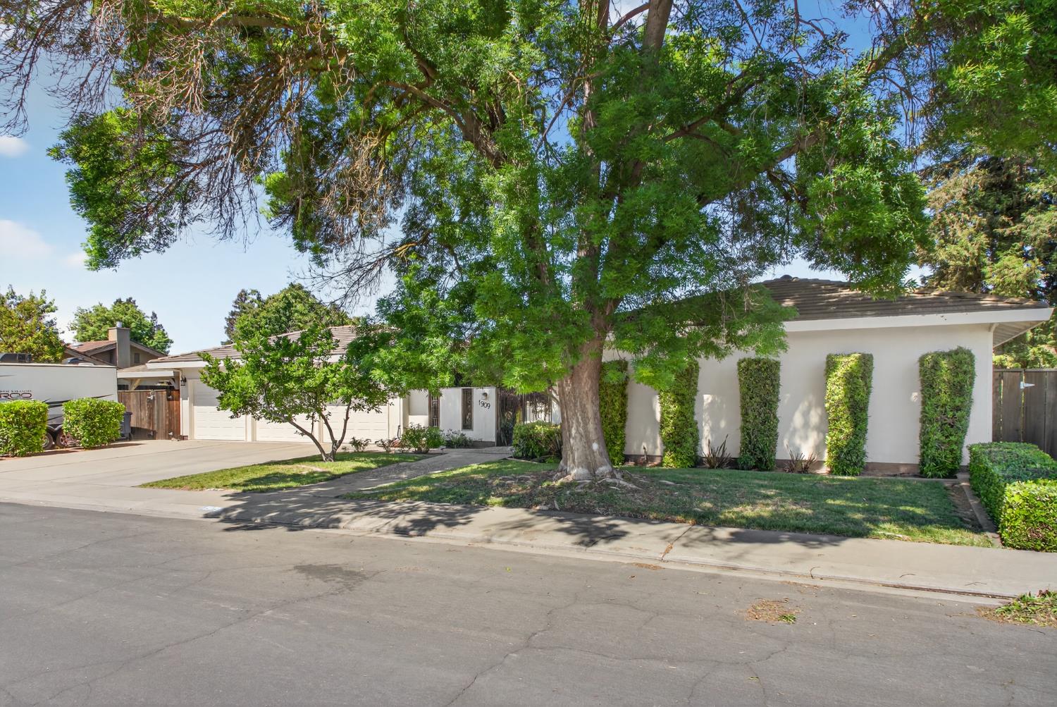 1909 Chelwood Way Modesto, CA 95355 - Photo 44 of 44 front view of a house with a street