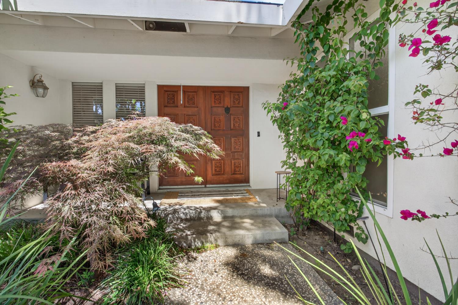 1909 Chelwood Way Modesto, CA 95355 - Photo 5 of 44 a front view of a house with a yard