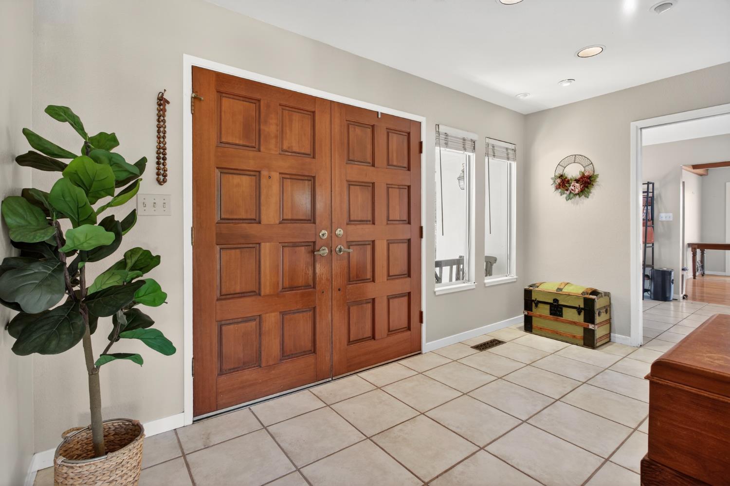 1909 Chelwood Way Modesto, CA 95355 - Photo 8 of 44 a bedroom with a bed and a potted plant