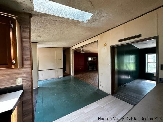 16 Stewart Road Cairo, NY 12470 - Photo 14 of 22 a view of a hallway with wooden shelves