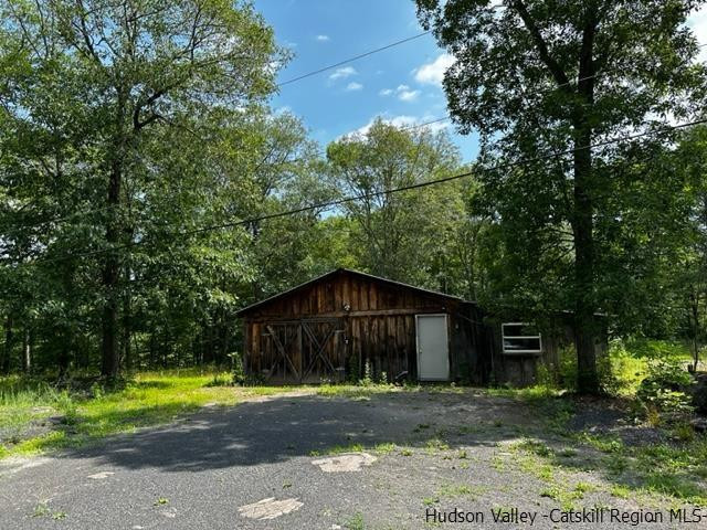 16 Stewart Road Cairo, NY 12470 - Photo 18 of 22 a view of a barn in the middle of a yard